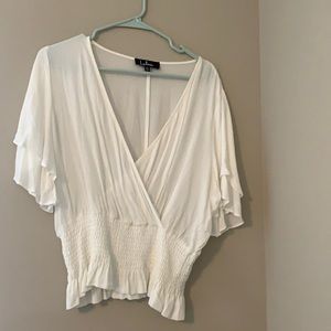 White V-neck with cinched waist